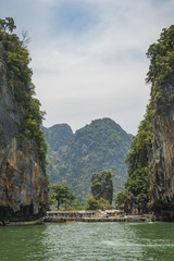 Fototapeta na wymiar Boats by James Bond Island, Thailand