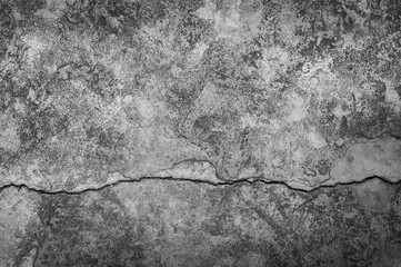 Grungy wall with large crack cement floor texture,cement large crack for dark background - obrazy, fototapety, plakaty