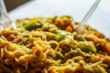 famous noodles in India: maggi cooked hot served