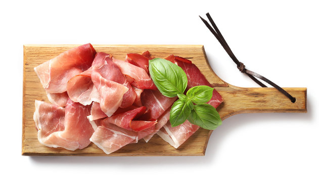 Prosciutto On Wooden Cutting Board