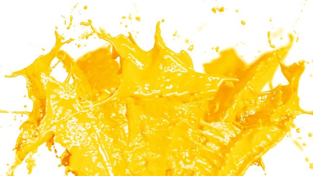 Beautiful Orange Juice Splashes in Slow Motion and Freeze Motion, Green Screen. Flying Through Drops. Useful for Titles and Intro. 3d Animation Food and Health Concept. 4k UHD 3840x2160.