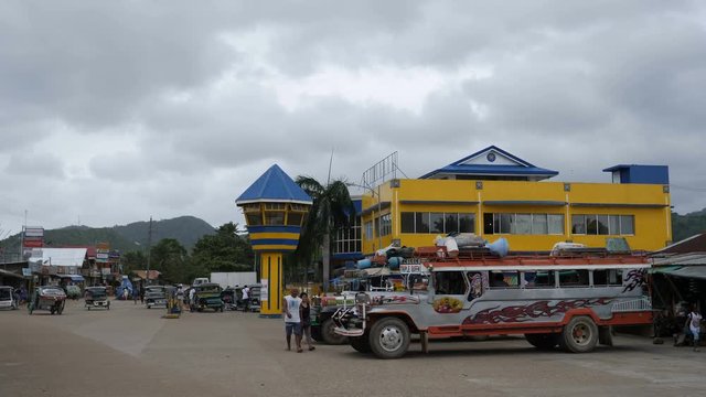 Jeepneys and tricycles at bus terminal Taytay, Palawan, Philippines