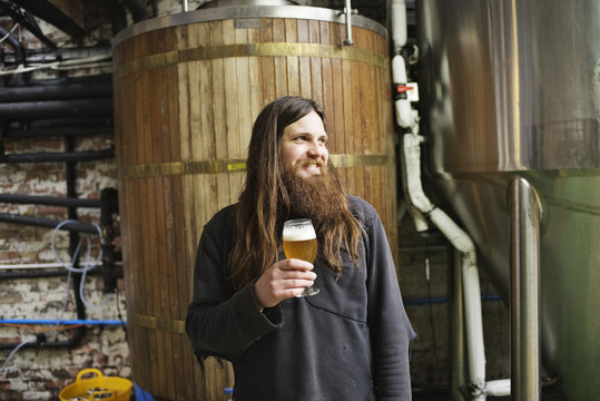 Portrait of a beer brewer