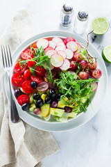 summer fresh healthy vegan lunch bowl. shot from above on a white marble table. copy space, healthy eating