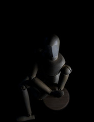 mannequin posing with black background