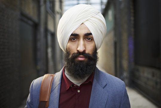 Portrait of bearded man wearing turban