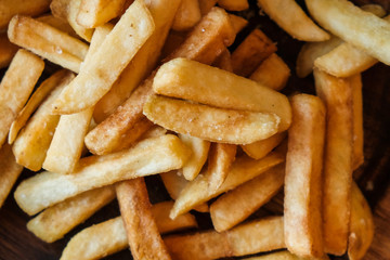 Delicious looking French fries background.