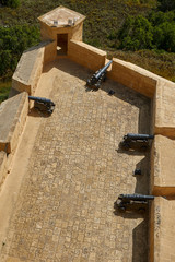 Fototapeta na wymiar Old cannons in the Citadel, Victoria Rabat, Gozo island, Malta