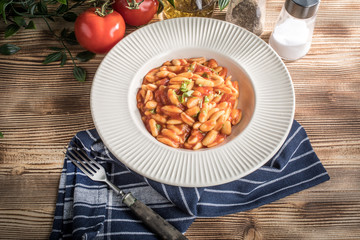 Cavatelli pasta with fresh tomato sauce.