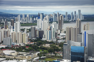 The beautiful and modern skyline of tall city buildings of Downtown Panama under a blue sky