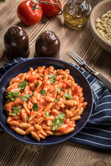 Cavatelli pasta with fresh tomato sauce.