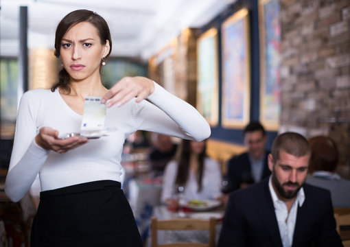 waitress woman holding a tray with money