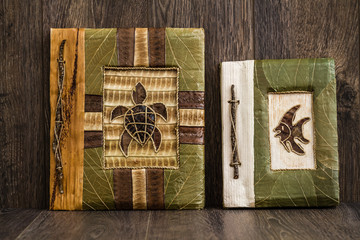 Handmade Notebooks Decorated with Natural Plants on Wooden Background