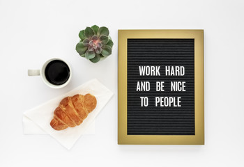 Letter Board Quote on White Desk Background with Miniature Succulent Plant, Cup of Coffee, Fresh Croissant Pastry