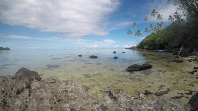 Time lapse - Landscape view of Taakoka islet at dusk in Muri Lagoon in Rarotonga, Cook Islands. 
