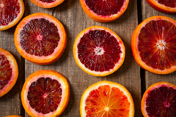 blood orange on wooden surface