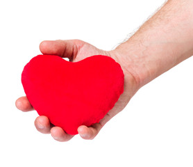 Obraz premium Man hand, holding red heart, giving to someone, isolated on white background