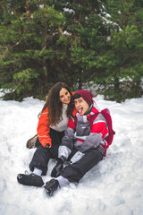 Fototapeta na wymiar Lovely couple smiling in the snow