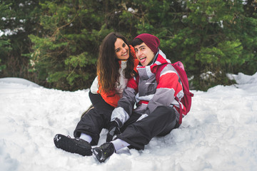 Fototapeta na wymiar Lovely couple smiling in the snow