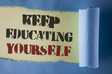 Writing note showing  Keep Education Yourself. Business photo showcasing never stop learning to be better Improve encourage written under Tear Folded paper on plain White background.