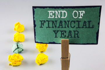 Handwriting text writing End Of Financial Year. Concept meaning Taxes time accounting June database...