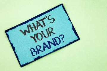 Conceptual hand writing showing What Is Your Brand Question. Business photo text Define Individual trademark Identify Company written on Sticky Note Paper on plain background.
