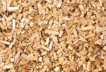 Wood chips of alder-tree for smoking or recycle. Texture for background.