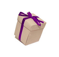 Square packaging for gift with ribbon and bow.