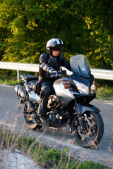 rider on a motorcycle - summer road trip on a motorbike