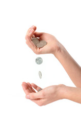 Female hands with coins on white background