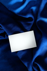 Navy blue silk and white paper. Theme for luxurious classic. Start idea for everything design