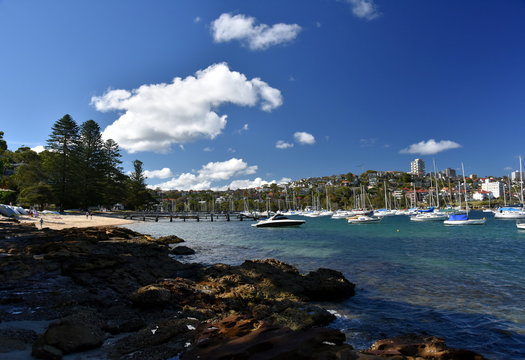 Balgowlah, Australia - Feb 4, 2018. Yachts in North Harbour at Fourty Baskets Beach on a sunny day. Manly in the background.