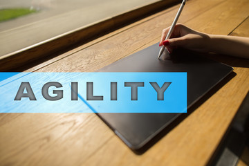 Agility text on virtual screen. Business technology and internet concept.
