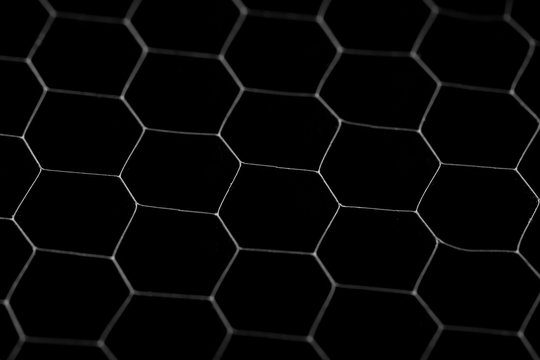 Black circle background. Steel grating, texture black grid. © glazunoff