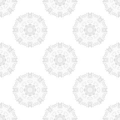 Floral vector ornament. Seamless abstract classic background with flowers. Pattern with light repeating floral elements. Ornament for fabric, wallpaper and packaging