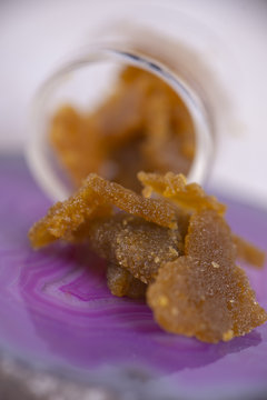 Macro detail of cannabis concentrate live resin (extracted from medical marijuana)