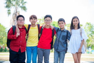 Group of asian student smiling in school park