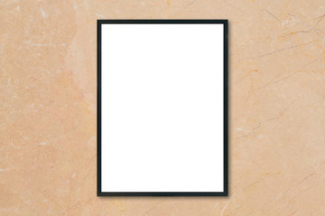 Mock up blank poster picture frame hanging on brown marble wall background in room - can be used mockup for montage products display and design key visual layout.