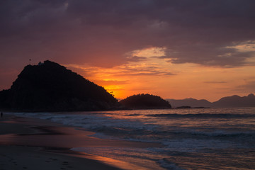 Sunrise on Copacabana beach Rio de Janeiro city with beautiful royal colors