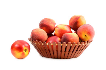 peach fruit in basket