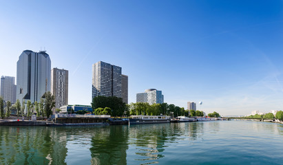 Fototapeta na wymiar New buildings district in Paris along Seinge river, panoramic view