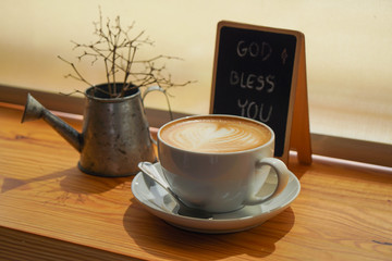 A cup of coffee in the moring with blessing message 