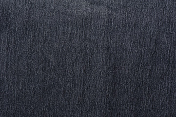 Texture of blue jeans textile close up