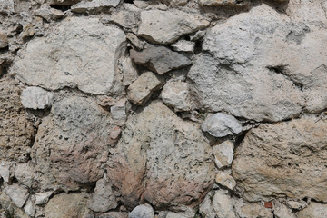 Masonry of an ancient fortress. Stone texture, background.