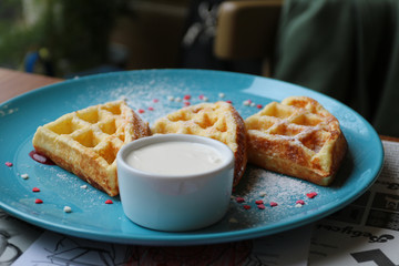 Breakfast. Wafers with sour cream.