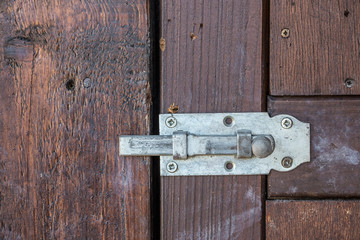 Security lock for an old wooden door in the garden