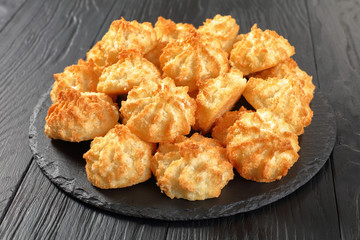 coconut macaroons cookies on a stone plate
