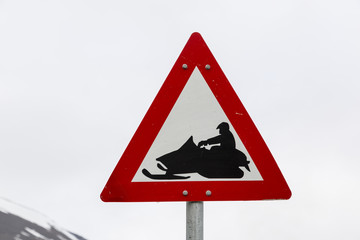 Road sign Attention snowmobile in Longyearbyen, Spitsbergen, Norway