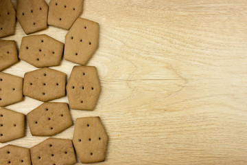 Chocolate Сookies and snacks on wooden table. Food concept. Empty space for text and design