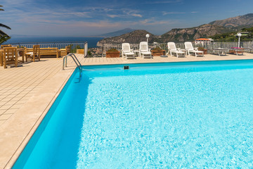 Obraz na płótnie Canvas Swimming pool on the Amalfi Coast with views of the Gulf of Naples and Vesuvius. Sorrento. Italy